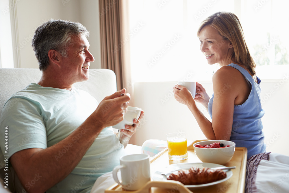 Wife Bringing Husband Breakfast In Bed On Tray Wife Bringing Husband Breakfast In Bed On Tray