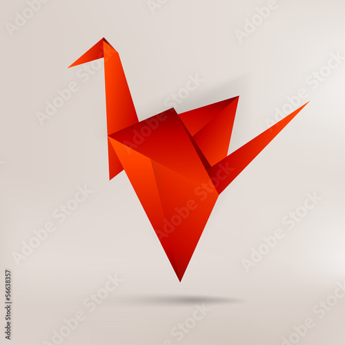 Origami paper bird on abstract background