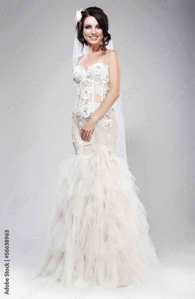 Happy Bride in Wedding Sleeveless Dress Smiling. Happy Bride in Wedding Sleeveless Dress Smiling.