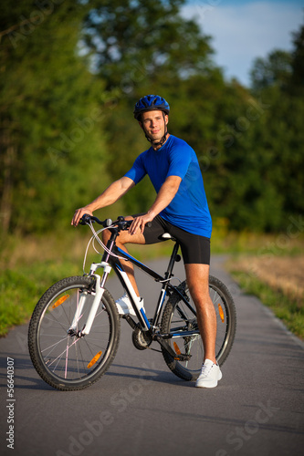 Healthy lifestyle - young man biking