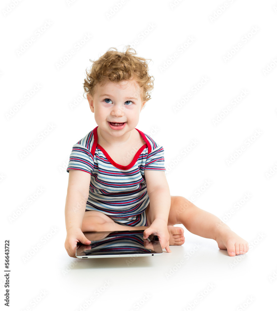 baby boy playing with digital tablet isolated on white baby boy playing with digital tablet isolated on white