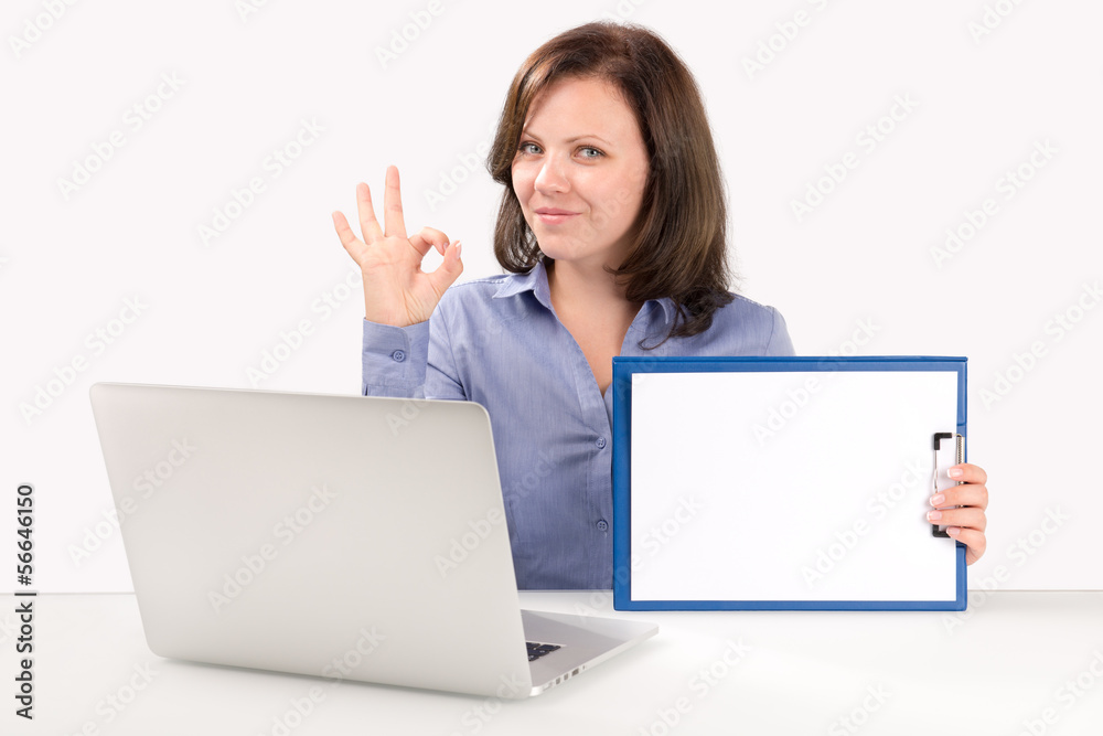 Business woman is sitting in front of a laptop Business woman is sitting in front of a laptop