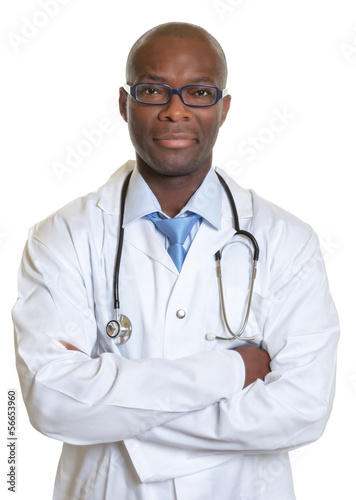 African doctor with crossed arms looking at camera © Daniel Ernst