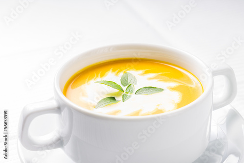 Pumpkin soup on served table