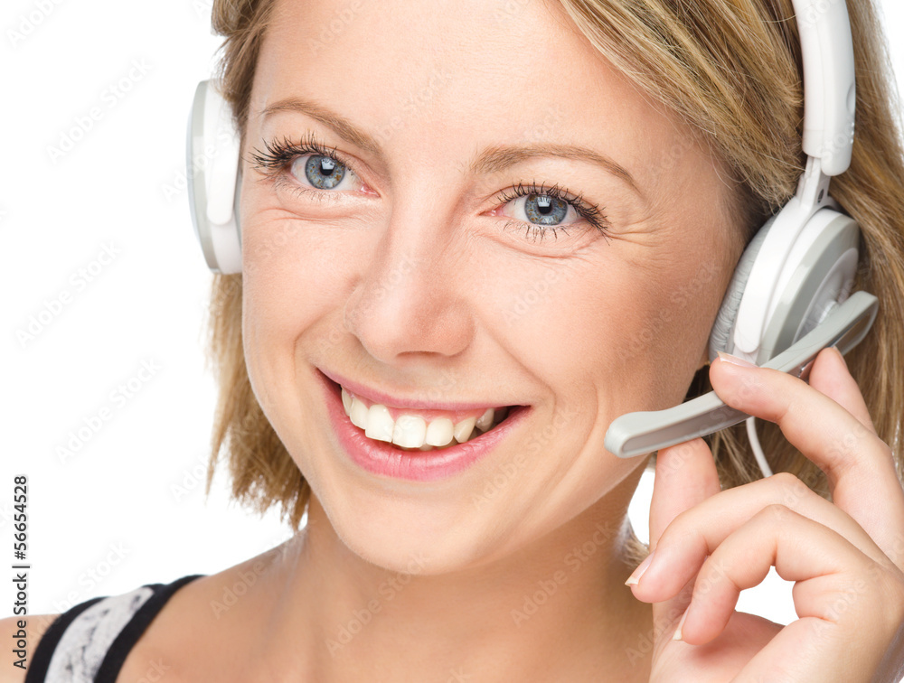 Lovely young woman is talking to customers Lovely young woman is talking to customers