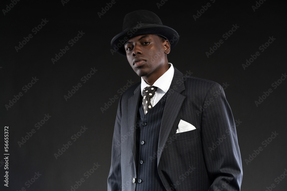 Retro african american gangster wearing striped suit and tie and Retro african american gangster wearing striped suit and tie and