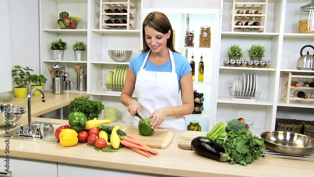 Healthy Caucasian Girl Slicing Fresh Vegetables Healthy Caucasian Girl Slicing Fresh Vegetables