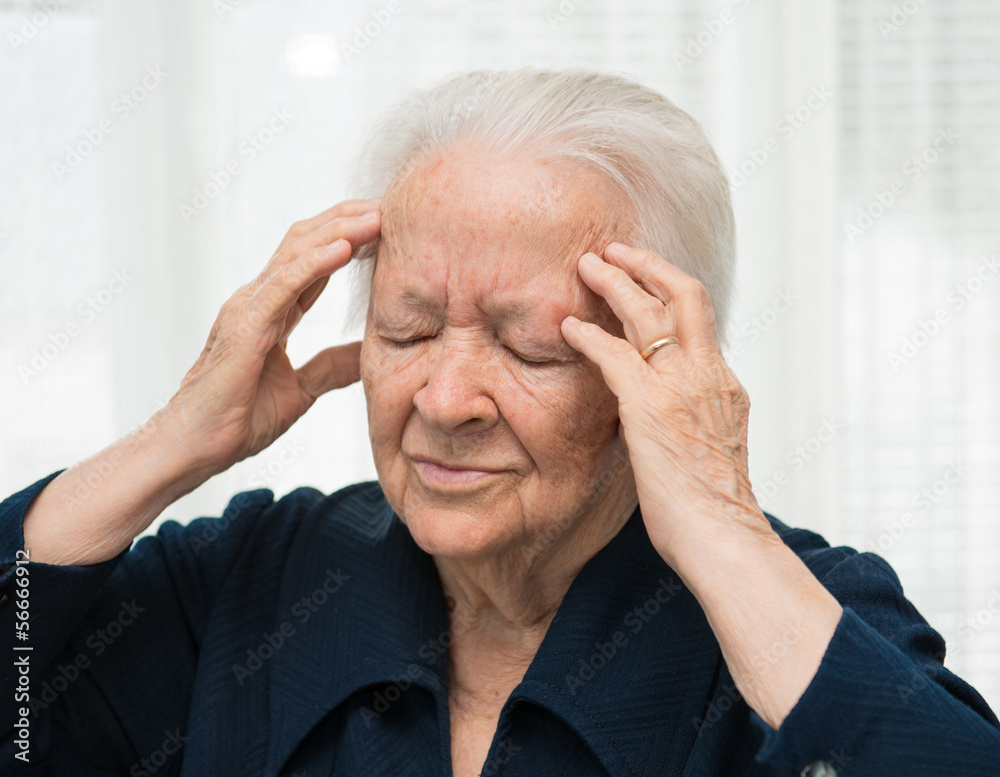 Senior woman suffering from headache Senior woman suffering from headache