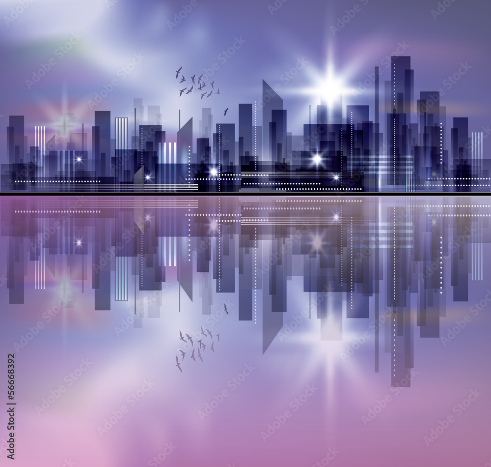 City skyline at night with reflection in water
