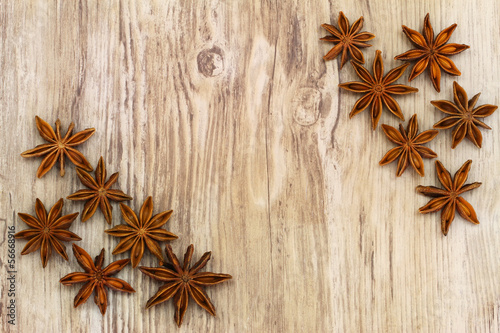 Star anise on wooden surface with copy space