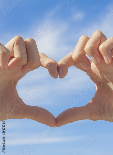 Heart shape formed by hands