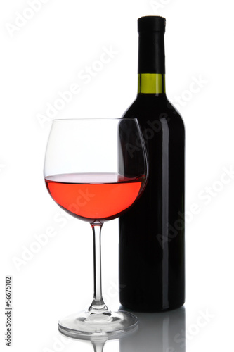 Red wine glass and bottle of wine isolated on white
