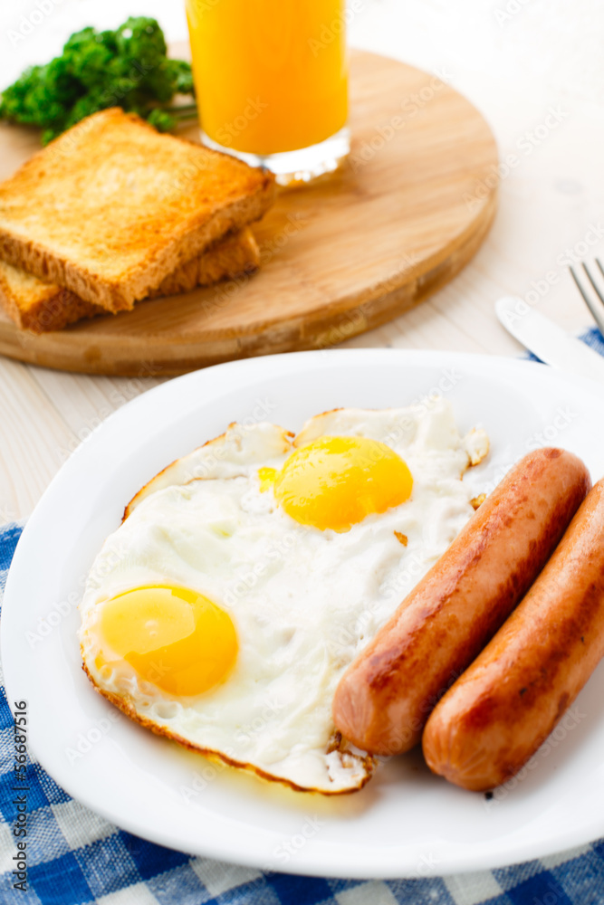 Fried eggs with sausages. Fried eggs with sausages.