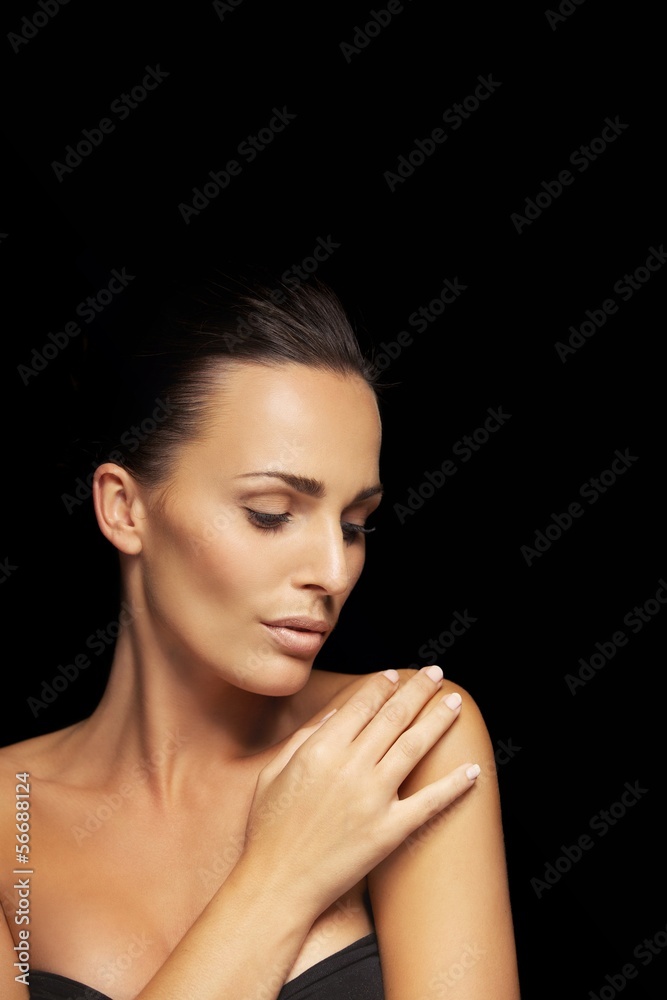Young beauty with glowing complexion Young beauty with glowing complexion