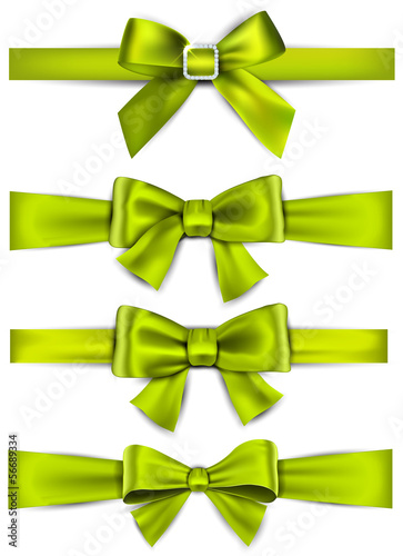 Satin green ribbons. Gift bows.