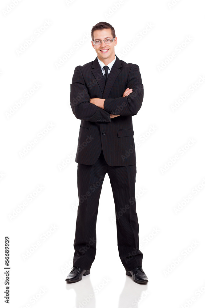 businessman in a suit with arms crossed businessman in a suit with arms crossed