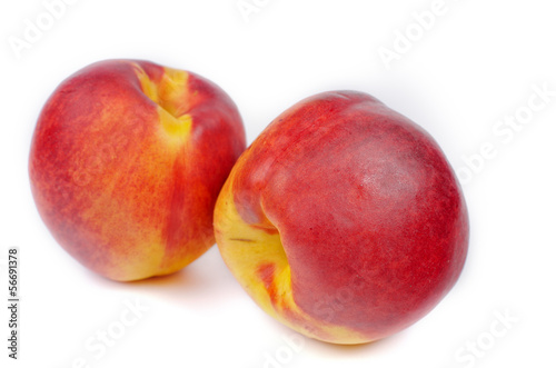 Close up of a two ripe nectarines