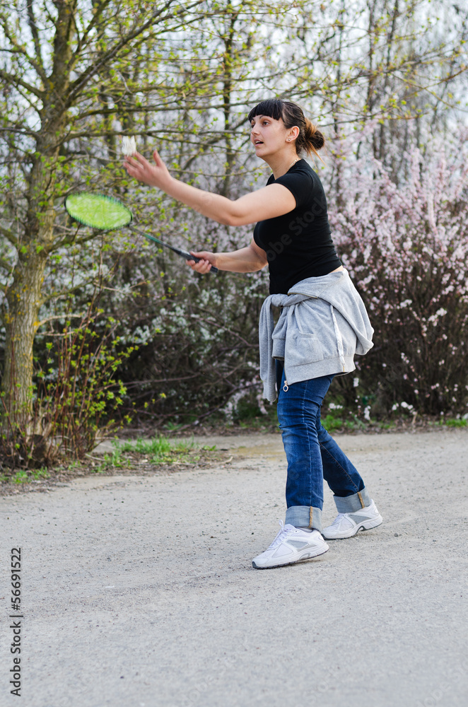 Fototapeta premium Woman playing badminton