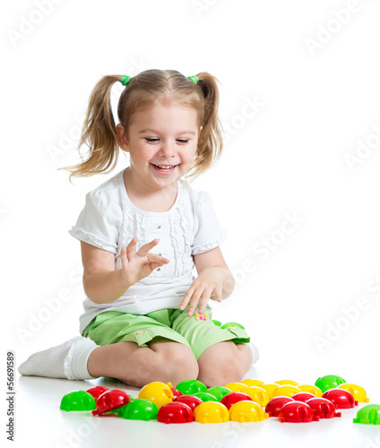 little girl kid playing wit...