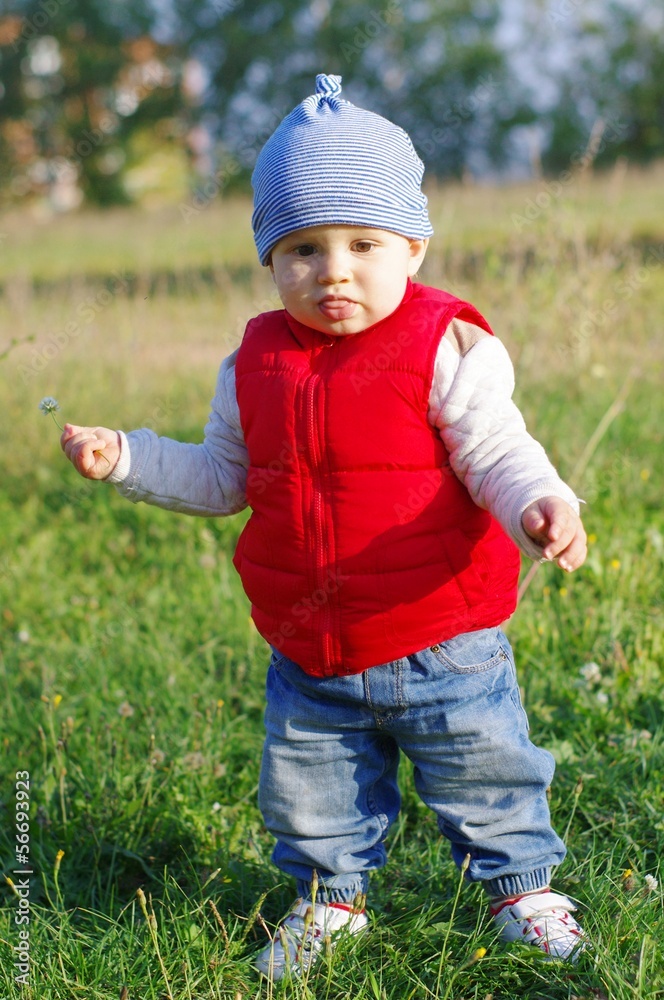 funny baby age of 11 months walking outdoors funny baby age of 11 months walking outdoors