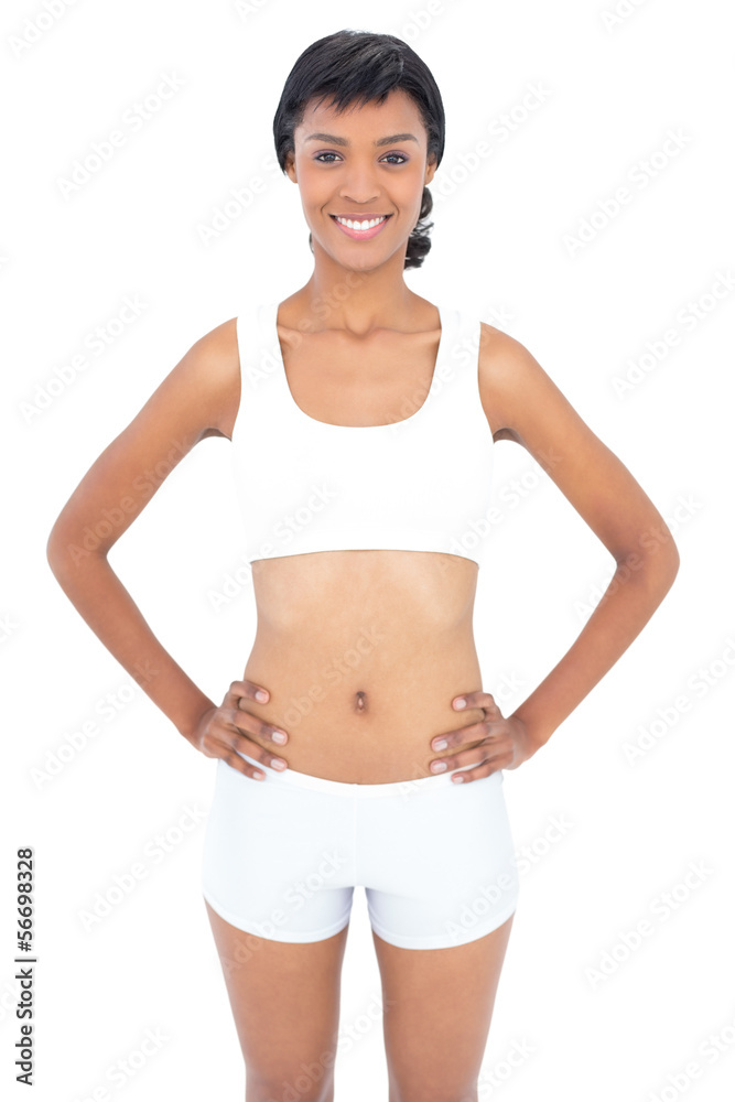 Attractive fit woman posing hands on the hips Attractive fit woman posing hands on the hips