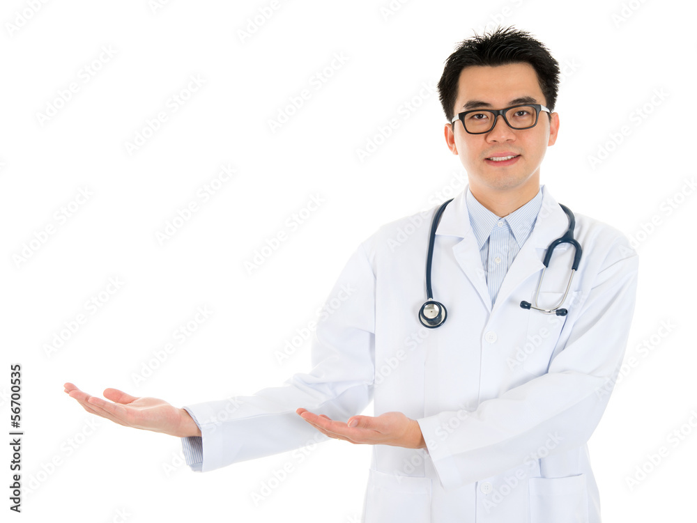 Asian male medical doctor showing something Asian male medical doctor showing something
