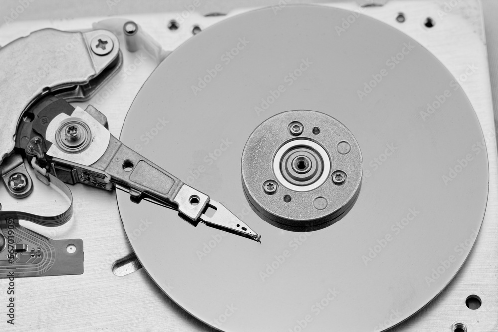 Open computer hard drive on white background Open computer hard drive on white background