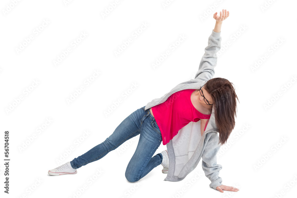 Naklejka premium Pretty young woman making hip hop pose