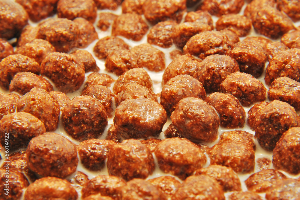 Chocolate cereals with milk background Chocolate cereals with milk background
