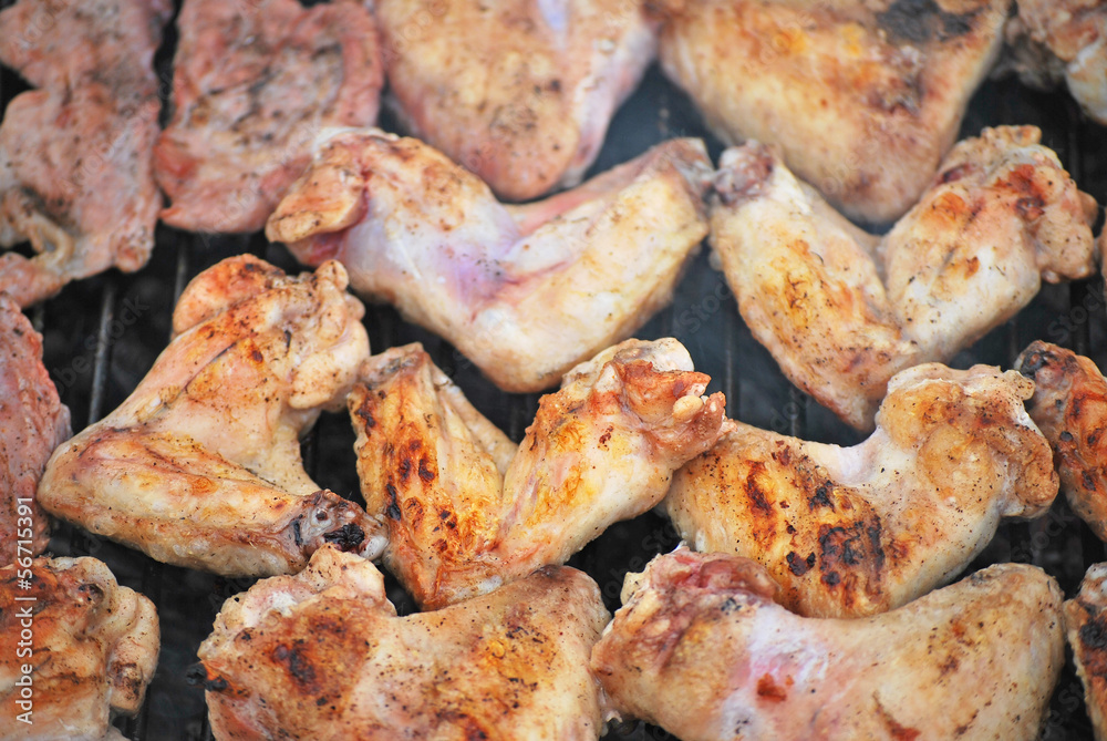 Fried meat on grill Fried meat on grill