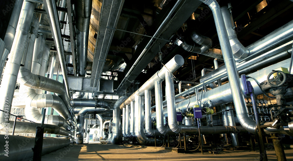 Industrial zone, Steel pipelines and cables in blue tones Industrial zone, Steel pipelines and cables in blue tones