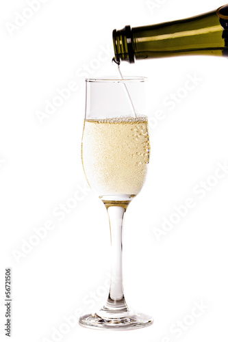 Champagne pouring into a glass