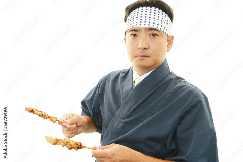 笑顔の焼き鳥屋の主人