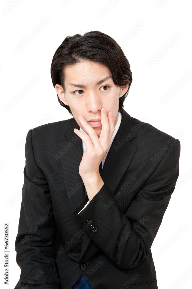 悩む若いビジネスマン 悩む若いビジネスマン