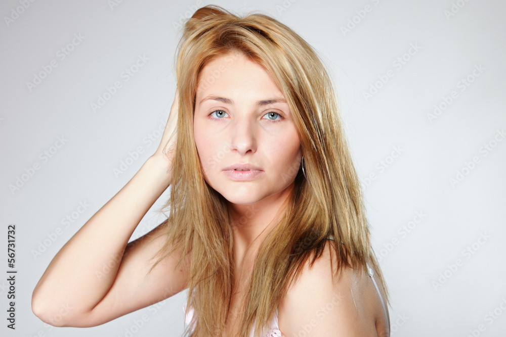 Attractive blonde woman with no make up