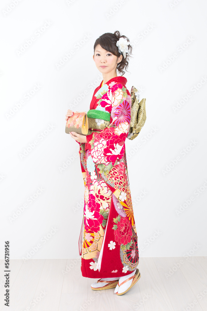 Beautiful asian kimono woman on white background Beautiful asian kimono woman on white background