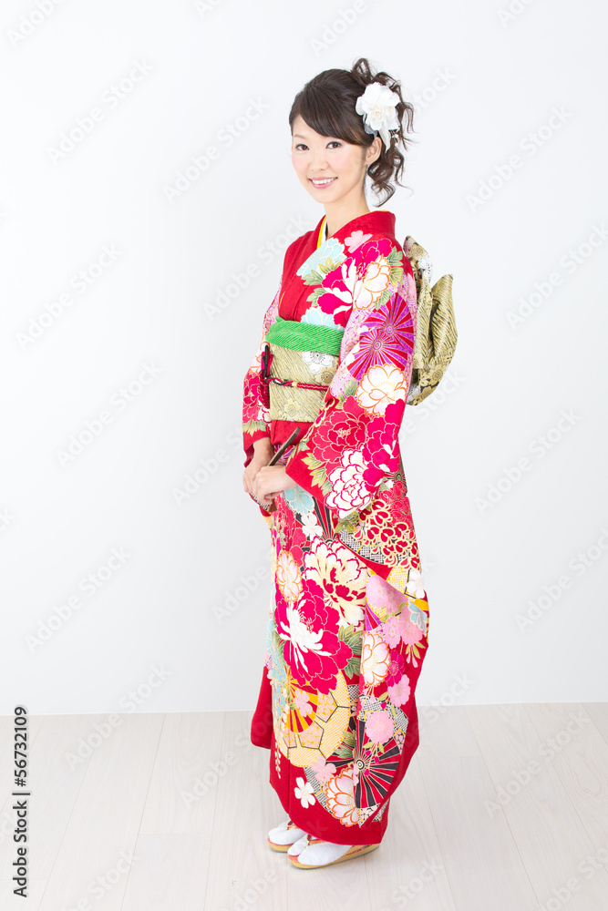 Beautiful asian kimono woman on white background Beautiful asian kimono woman on white background