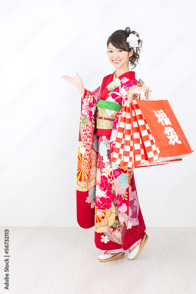 Beautiful asian kimono woman on white background Beautiful asian kimono woman on white background