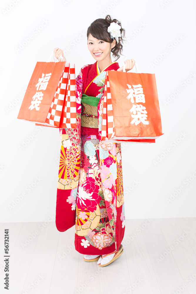 Beautiful asian kimono woman on white background