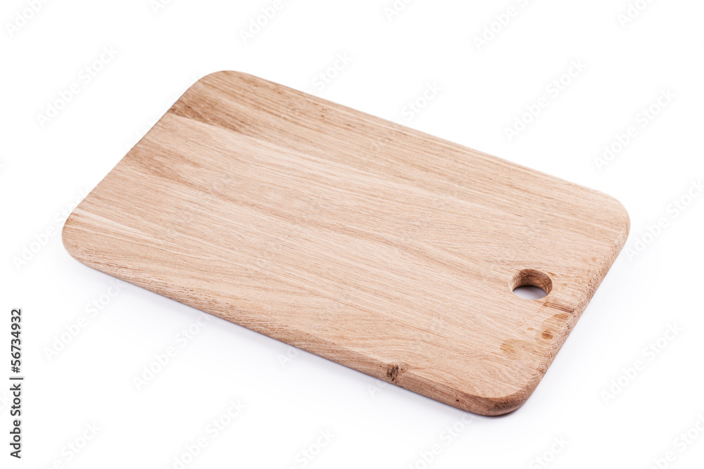 clean oak cutting board isolated on white