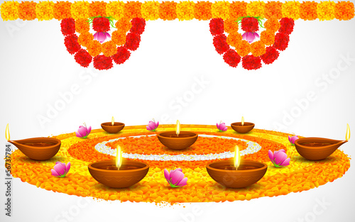 Decorated Diwali Diya on Flower Rangoli