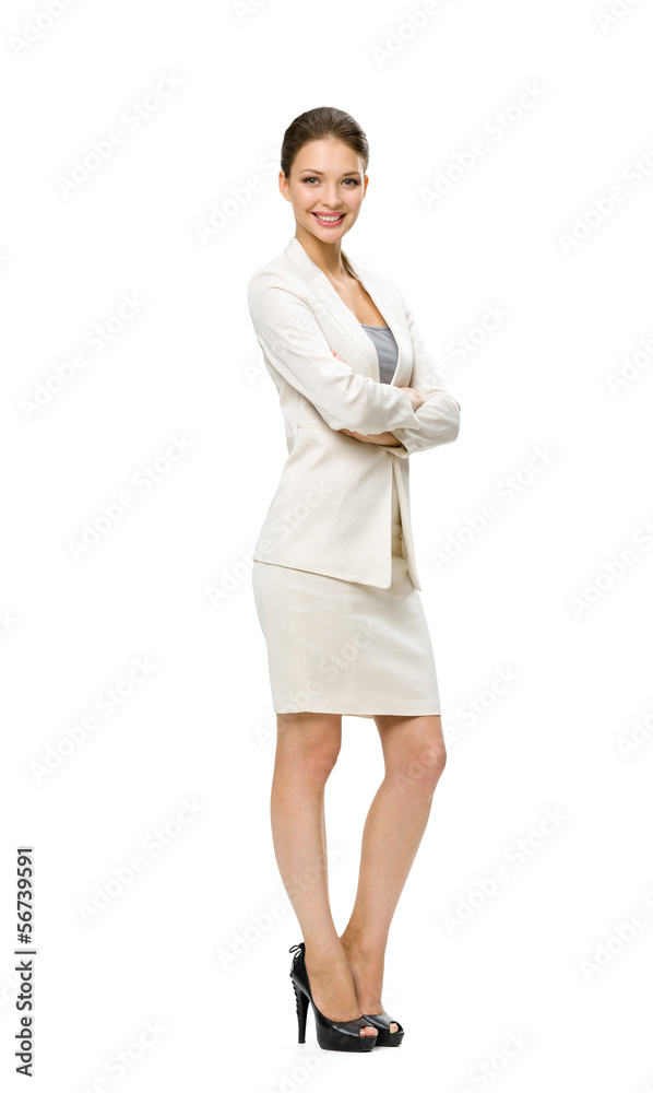 Full-length portrait of business woman with her hands crossed Full-length portrait of business woman with her hands crossed