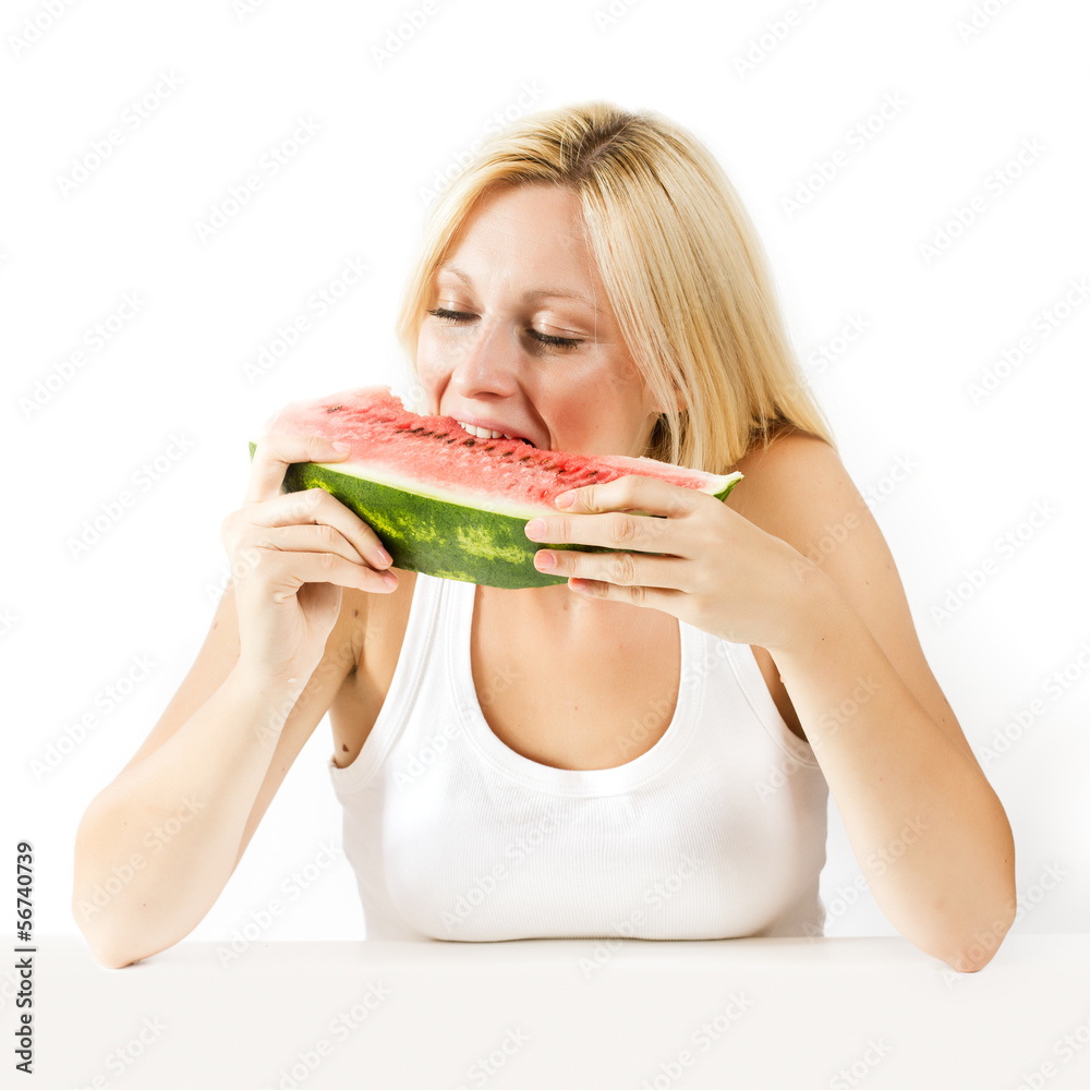 Happy young woman eating fresh watermelon Happy young woman eating fresh watermelon