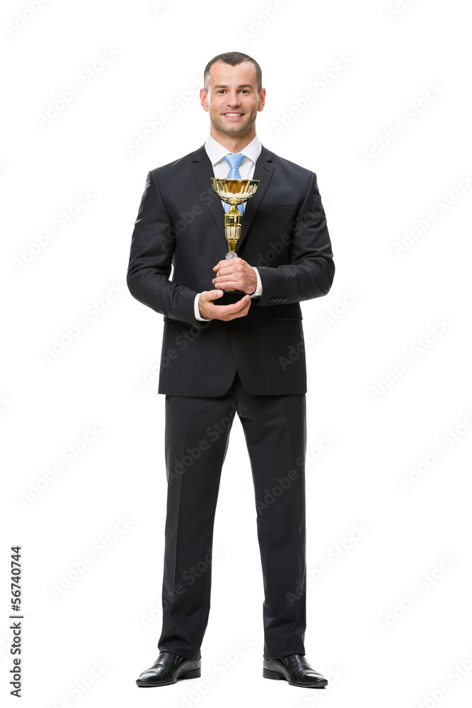 Full-length portrait of business man with gold cup Full-length portrait of business man with gold cup