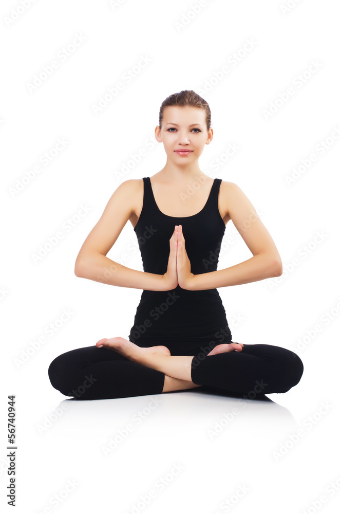 Woman in lotus pose on white