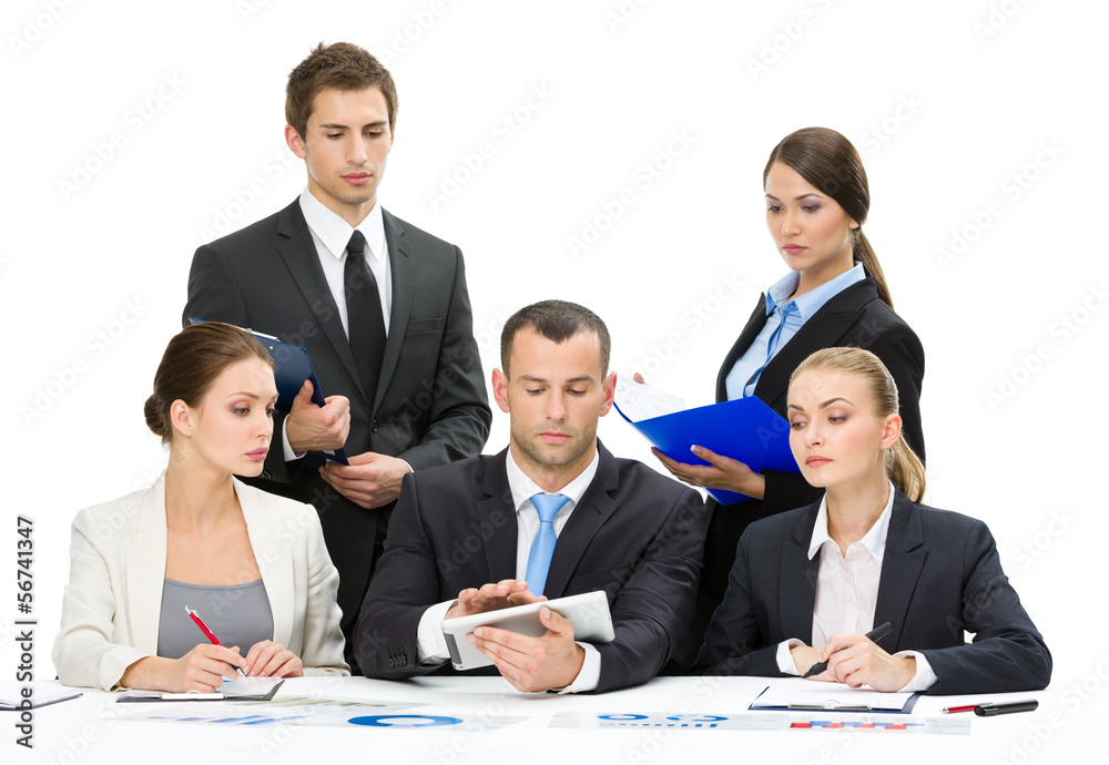 Fototapeta premium Group of executives discussing while sitting at the table