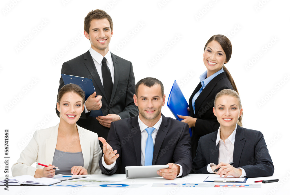 Group of business people working while sitting at the table Group of business people working while sitting at the table