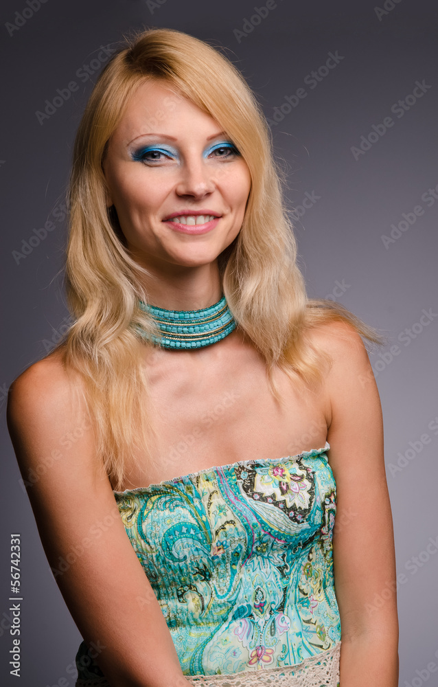 Studio portrait of a girl in blue Studio portrait of a girl in blue
