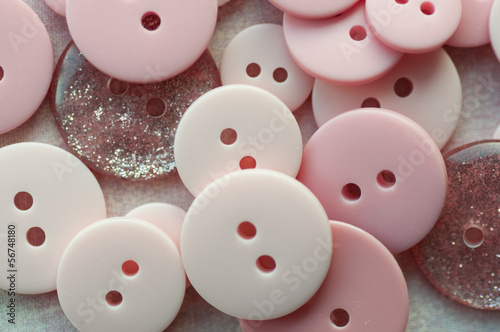 Close-up of assorted pink buttons