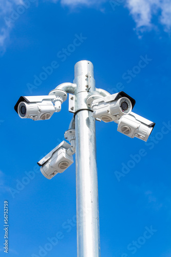 CCTV TV, security camera on blue sky background